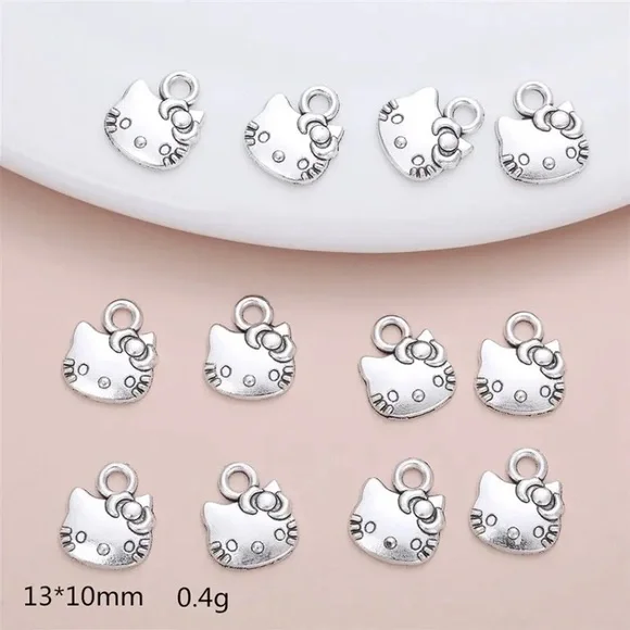 Sanrio, Jewelry, 2 Pcs Silver Hello Kitty Charm Lot Sanrio 76 7 W Free  Double Sided Charm